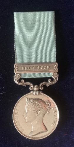 The Army of India Medal Bhurtpoor to Lieutenant-Colonel R. 'Tosh' Daly, 14th  Foot, who was most severely wounded,  his left leg being amputated where he fell- leading the Light Company at the head of  storming of Bhurtpoor in January 1826.  he remained in the Army and went to the Royal Military Academy Sandhurst, (House Captain later Major of Companies)where the sound of his wooden leg would warn Cadets of his presence